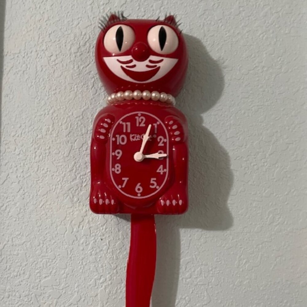 Kit Kat lady red clock